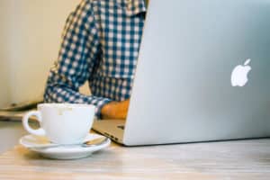 guy working on email marketing on laptop