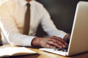 Professional writer working on laptop